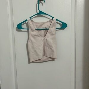 Light pink tank crop top.